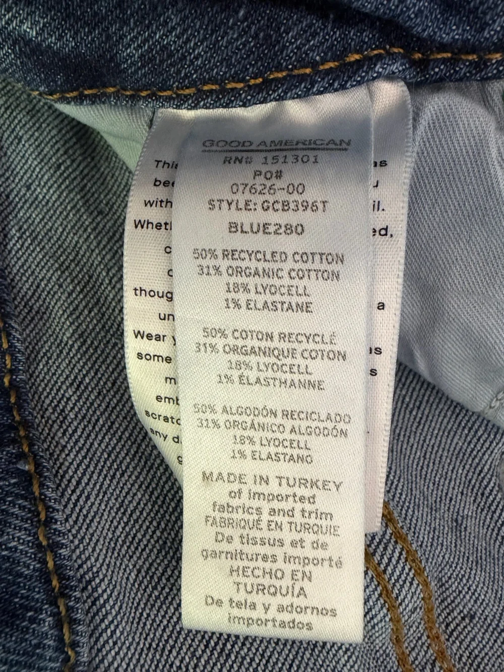 Good American Good Legs Flare Jeans Dark Wash Raw Hem Recycled Cotton Size 6/28